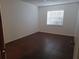Bedroom with tile floor and window offering natural light at 207 Esplanade Way # 101, Casselberry, FL 32707