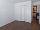 Bedroom featuring bi-fold closet doors and tile floor at 207 Esplanade Way # 101, Casselberry, FL 32707