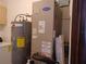 Image of a Carrier furnace and Rheem water heater in the utility closet at 207 Esplanade Way # 101, Casselberry, FL 32707