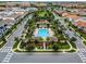 Eagle Creek community with a pool, palm trees, green space, and walking paths in a neighborhood setting at 10533 Belfry Cir, Orlando, FL 32832