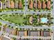 Aerial view of Eagle Creek community featuring a pool, playground, and green space at 10533 Belfry Cir, Orlando, FL 32832