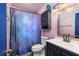 Cozy bathroom featuring galaxy shower curtain and modern vanity at 1101 Mizell Rd, Leesburg, FL 34748