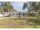 Home exterior with a playground, carport and fenced yard at 1101 Mizell Rd, Leesburg, FL 34748