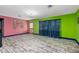 Large living room boasting vibrant wall colors and unique flooring at 1101 Mizell Rd, Leesburg, FL 34748