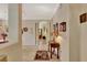 Inviting foyer with tile flooring, arched doorways, and decorative accents creating a warm ambiance at 11556 Via Lucerna Cir, Windermere, FL 34786