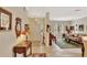 Elegant living room featuring tile floors, a piano, and stained-glass windows for a unique touch at 11556 Via Lucerna Cir, Windermere, FL 34786