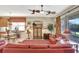 Bright and airy living room with fireplace and backyard views at 11556 Via Lucerna Cir, Windermere, FL 34786