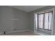 Simple bedroom with a window and neutral paint at 1668 Spicewood Ln, Casselberry, FL 32707