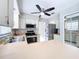 Modern kitchen with stainless steel appliances and white cabinets at 1668 Spicewood Ln, Casselberry, FL 32707