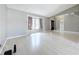 Spacious living room featuring a large window and mirrored closet doors at 1668 Spicewood Ln, Casselberry, FL 32707