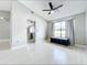 Neutral living room featuring wood floors and a large window at 1668 Spicewood Ln, Casselberry, FL 32707