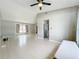 Bright living room with wood floors, high ceilings, and large windows at 1668 Spicewood Ln, Casselberry, FL 32707