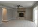Spacious living room with a unique stone fireplace and tile flooring at 1668 Spicewood Ln, Casselberry, FL 32707