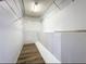 Walk-in closet with built-in shelving and hanging rods at 1668 Spicewood Ln, Casselberry, FL 32707