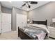 Inviting bedroom with a black frame bed and natural light, creating a relaxing atmosphere at 1757 Standing Rock Cir, Oakland, FL 34787