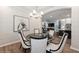 Open dining room adjacent to the living room and kitchen, perfect for entertaining guests in style at 1757 Standing Rock Cir, Oakland, FL 34787