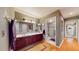 Bright bathroom with double sinks, white counters and wood-colored vanity plus a shower at 21 Abbey Ct, Haines City, FL 33844