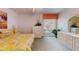 Bright bedroom with a ceiling fan, natural light, and ample closet space at 21 Abbey Ct, Haines City, FL 33844