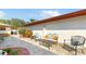 Paver patio with outdoor seating area, perfect for relaxing or entertaining guests at 21 Abbey Ct, Haines City, FL 33844
