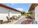 Paver patio with furniture for outdoor entertaining and golf course views at 21 Abbey Ct, Haines City, FL 33844
