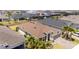 A beautiful aerial view of the home showcasing the manicured lawn and neighborhood at 2126 Ridge Pointe Ln, Clermont, FL 34715