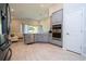 Modern kitchen with stainless steel appliances and plenty of counter space, open to living area at 2126 Ridge Pointe Ln, Clermont, FL 34715