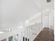 Hallway overlooking living area on the second floor at 220 Wimbledon Cir, Lake Mary, FL 32746