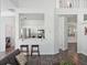 The kitchen has bar seating that is adjacent to the living space at 220 Wimbledon Cir, Lake Mary, FL 32746