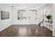 Inviting living area featuring wood floors, ample natural light and a staircase at 220 Wimbledon Cir, Lake Mary, FL 32746