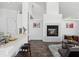 Cozy living room with a modern fireplace and open floor plan at 220 Wimbledon Cir, Lake Mary, FL 32746