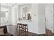 Open concept living space with bar seating and stainless steel appliances at 220 Wimbledon Cir, Lake Mary, FL 32746