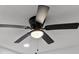 Close-up of a stylish ceiling fan with a light fixture at 2205 Pine Island Dr, New Smyrna Beach, FL 32168
