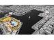 Stunning aerial view of community with clubhouse, pool, and lake, highlighting prime location of home at 2417 Annacella Ave, Kissimmee, FL 34741