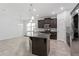 This kitchen features an island, stainless steel appliances and recessed lighting at 2417 Annacella Ave, Kissimmee, FL 34741