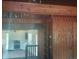 Open-concept living room with kitchen and ladder to an upper level at 2603 E Lake Hartridge Dr, Winter Haven, FL 33881