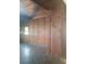 Rustic room featuring wood paneling, unique flooring, and charming details at 2603 E Lake Hartridge Dr, Winter Haven, FL 33881