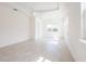 Spacious bedroom with a ceiling fan, tile flooring, and recessed lighting at 2604 Meadowedge Loop, St Cloud, FL 34772