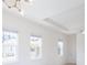 Bright bedroom featuring a tray ceiling and recessed lighting at 2604 Meadowedge Loop, St Cloud, FL 34772
