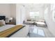 Bright bedroom offering both seating and bedroom furniture at 2604 Meadowedge Loop, St Cloud, FL 34772