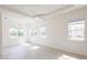 Light filled bedroom with a ceiling fan and recessed lighting at 2604 Meadowedge Loop, St Cloud, FL 34772