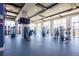 Modern gym featuring state-of-the-art equipment, ample natural light, and a spacious workout area at 2604 Meadowedge Loop, St Cloud, FL 34772