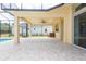 Covered lanai offers a relaxing outdoor living space, perfect for entertaining or enjoying the view at 2604 Meadowedge Loop, St Cloud, FL 34772