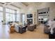 Inviting lounge area with fireplace, comfortable seating, and elegant décor at 2604 Meadowedge Loop, St Cloud, FL 34772