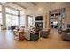 Elegant lounge area with comfortable seating, fireplace, and contemporary design elements at 2604 Meadowedge Loop, St Cloud, FL 34772