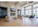 Stylish lounge area with modern furnishings, ample seating, and contemporary design at 2604 Meadowedge Loop, St Cloud, FL 34772
