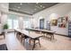 Spacious meeting room features multiple tables, comfortable seating, and bright natural light at 2604 Meadowedge Loop, St Cloud, FL 34772