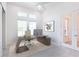 Modern office with tiled flooring, natural light, and a stylish desk setup at 2604 Meadowedge Loop, St Cloud, FL 34772