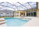 The pool has a screened enclosure and patio area, perfect for enjoying outdoor living at 2604 Meadowedge Loop, St Cloud, FL 34772