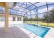 Inviting pool and spa surrounded by lush landscaping at 2604 Meadowedge Loop, St Cloud, FL 34772