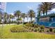Community entrance with the Twin Lakes sign surrounded by well-maintained landscaping at 2604 Meadowedge Loop, St Cloud, FL 34772